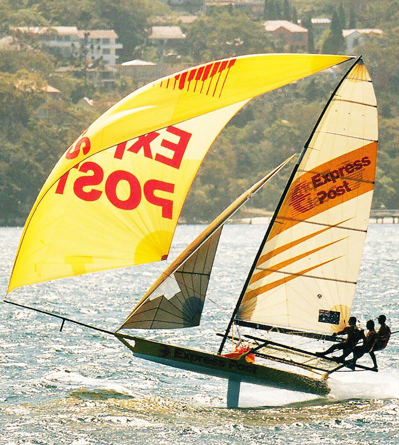 Express Post barely touches thw water on a NE spinnaker run on Sydney Harbour - photo © Frank Quealey