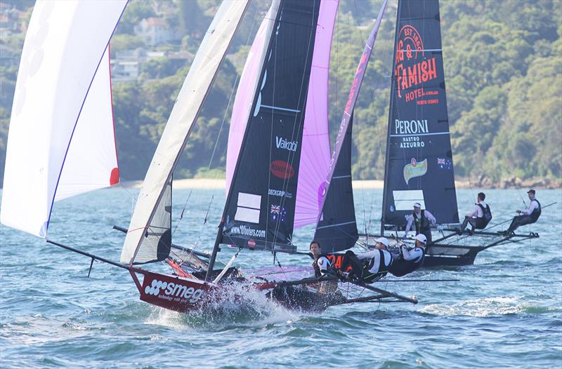 Smeg finishes third just ahead of Rag and Famish Hotel in Race 5 on 18ft Skiff 73rd JJ Giltinan Championship Day 4 photo copyright Frank Quealey taken at Australian 18 Footers League and featuring the 18ft Skiff class