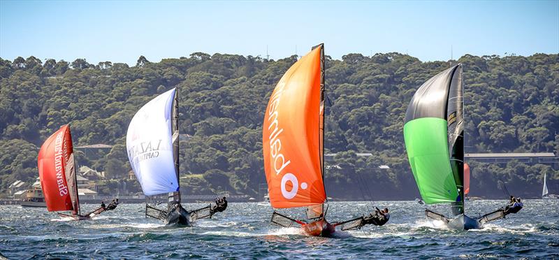 JJ Giltinan Championship spinnaker action photo copyright Michael Chittenden taken at Australian 18 Footers League and featuring the 18ft Skiff class