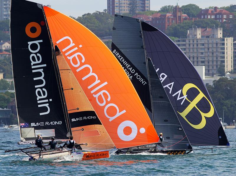 Team Balmain loves the close spinnaker action photo copyright Frank Quealey taken at Australian 18 Footers League and featuring the 18ft Skiff class