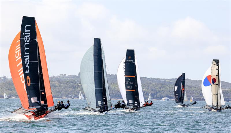 Rag and Famish Hotel leads the fleet downwind in Race 5 - 2023-24 NSW 18ft Skiff Championship - photo © SailMedia