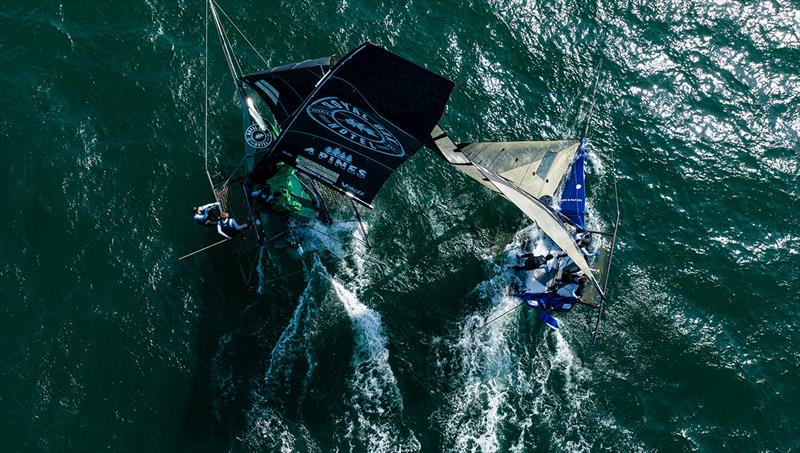 Fisher and Paykel and The Oak Double Bay-4 Pines hook up near the bottom mark - 2023-24 NSW 18ft Skiff Championship photo copyright SailMedia taken at Australian 18 Footers League and featuring the 18ft Skiff class