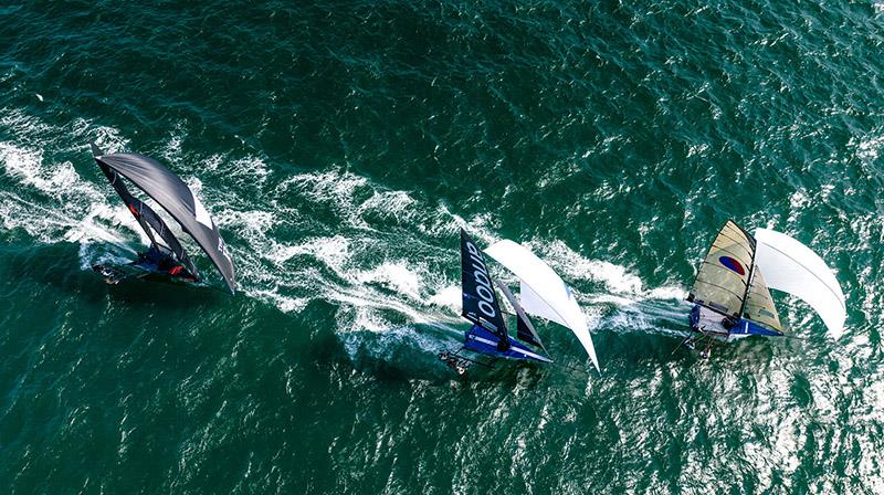 Yandoo, Andoo and The Rag head downwind in Race 8 last Sunday photo copyright SailMedia taken at Australian 18 Footers League and featuring the 18ft Skiff class