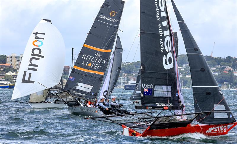 18ft Skiff Australian Championship Race 1: The fleet approach the rounding mark photo copyright SailMedia taken at Australian 18 Footers League and featuring the 18ft Skiff class