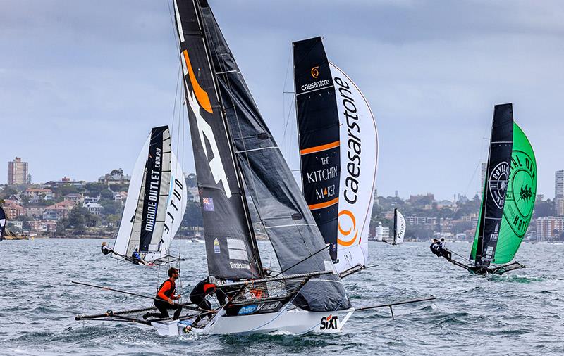 Fleet on the first spinnaker run - 18ft Skiff Australian Championship photo copyright SailMedia taken at Australian 18 Footers League and featuring the 18ft Skiff class