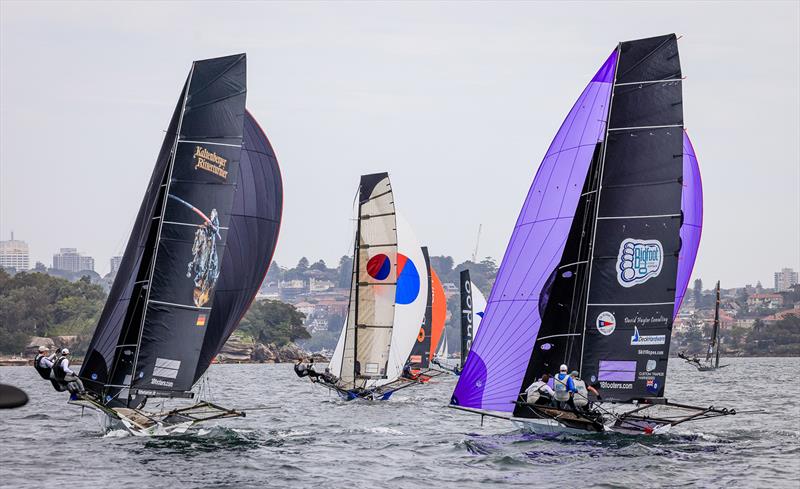 18ft Skiff 2024 JJ Giltinan Championship Invitation Race: Germany's Black Knight and Queensland's Big Foot photo copyright SailMedia taken at Australian 18 Footers League and featuring the 18ft Skiff class