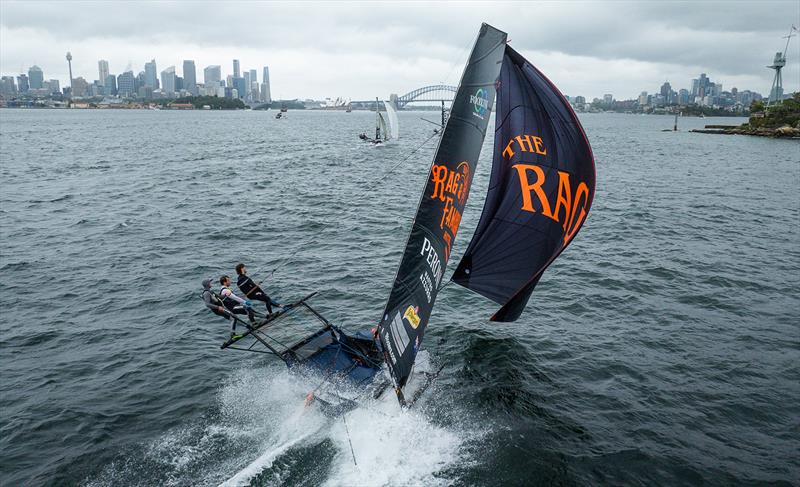 18ft Skiff 2024 JJ Giltinan Championship Race 1: The Rag at full throttle on the run to Athol Bay - photo © SailMedia