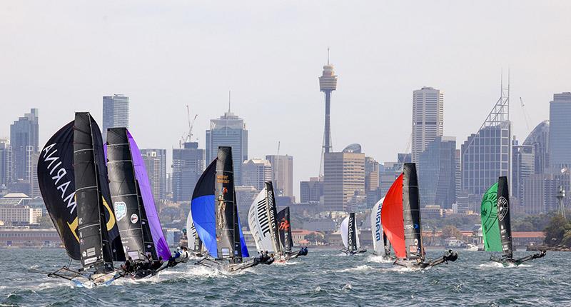 Spinnakers and the city - 2024 JJ Giltinan Championship - photo © SailMedia