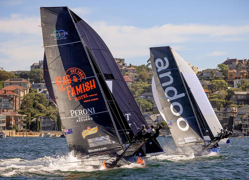 Defending champion Andoo wins Race 2 of the Winnings JJ Giltinan Championship ahead of hard charging Rag and Famish Hotel photo copyright SailMedia taken at Australian 18 Footers League and featuring the 18ft Skiff class