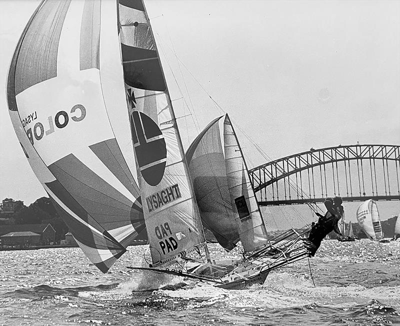 18s action of Lysaght Colorbond on a spinnaker run towards the Sydney Harbour bridge photo copyright Archive taken at Australian 18 Footers League and featuring the 18ft Skiff class