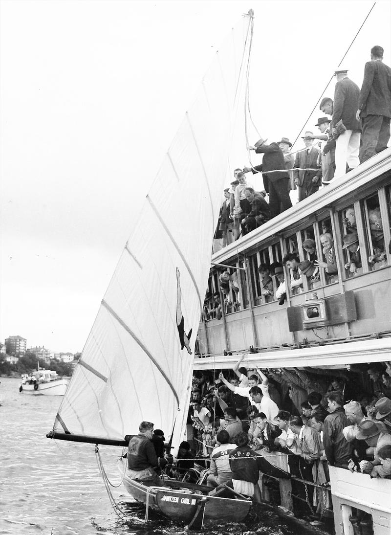 Chook Fraser's son, Jim Fraser receives the 1958 World champions ribbon on Jantzen Girl III photo copyright Archive taken at Australian 18 Footers League and featuring the 18ft Skiff class