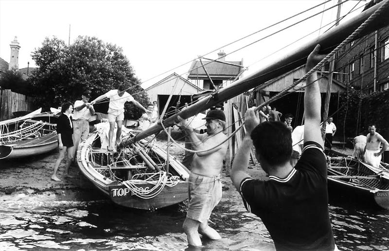 Joe Pearce, prepares Top Dog for a League race in the 1940s photo copyright Archive taken at Australian 18 Footers League and featuring the 18ft Skiff class