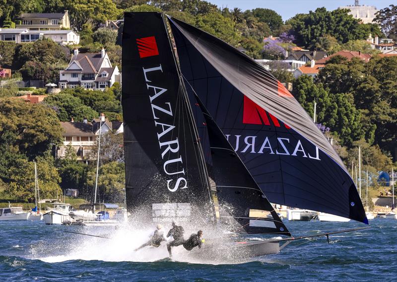 Heading for the finish line off Double Bay last Sunday photo copyright SailMedia taken at Australian 18 Footers League and featuring the 18ft Skiff class