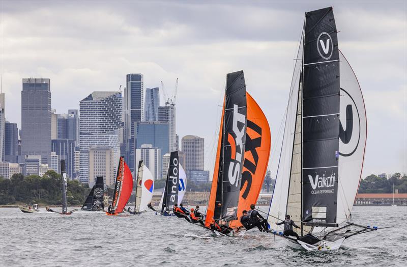 Heading toward the city on lap two - 18ft Skiff Club Championship Race 2 and SIXT Spring Championship Race 4 photo copyright SailMedia taken at Australian 18 Footers League and featuring the 18ft Skiff class
