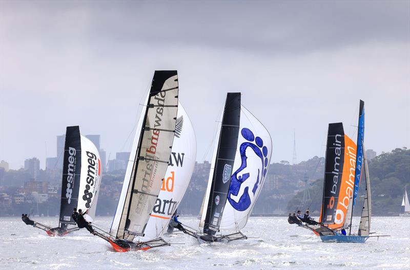 JJ Giltinan 18ft Skiff World Championship 2026 Invitation Race - Leaders on the first spinnaker run photo copyright SailMedia taken at Australian 18 Footers League and featuring the 18ft Skiff class