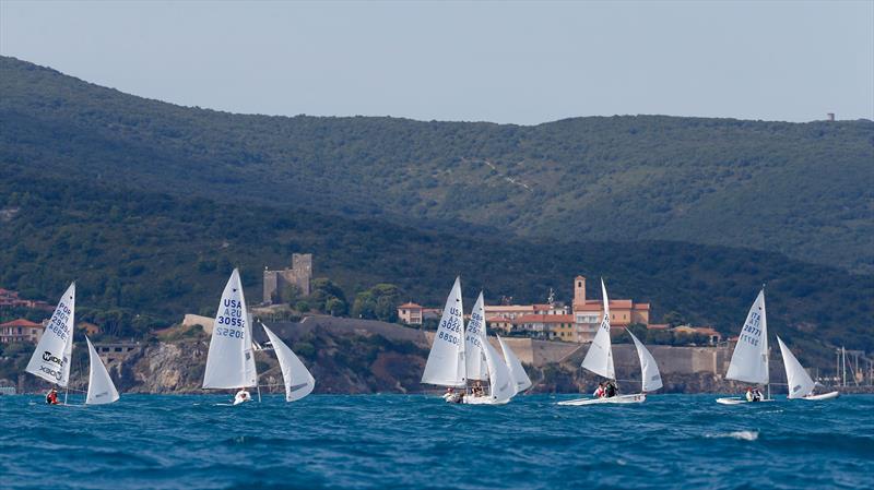 Action from day 5 of the Snipe Junior Worlds in Talamone, Italy photo copyright Matias Capizzano taken at Circolo della Vela Talamone and featuring the Snipe class