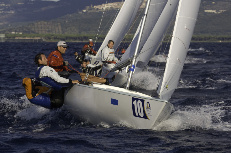 The Slovenian team of Antoncic, Strah & Hmeljak win the Soling worlds at Scarlino, Italy photo copyright James Robinson Taylor / www.jrtphoto.com taken at  and featuring the Soling class