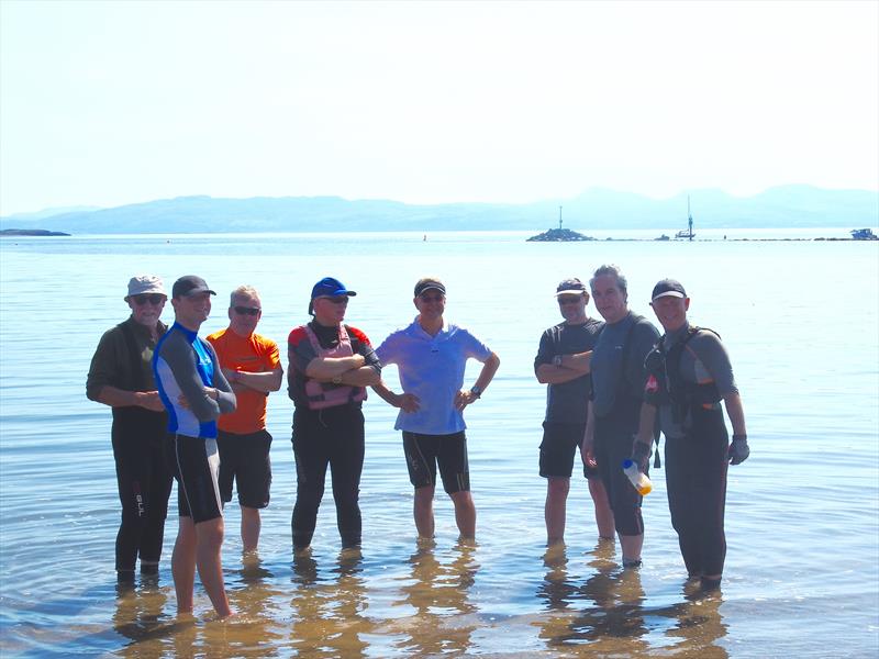 The Salcombe crew know how to reduce the smell from their feet on day 3 of the Superspars National Solo UK Championship photo copyright Will Loy taken at Plas Heli Welsh National Sailing Academy and featuring the Solo class