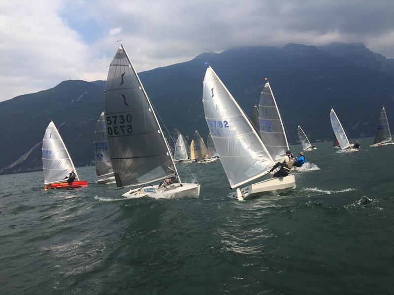 Nigel Davies crossing ahead of Vincenso Horey on day 2 of the Magic Marine Solo Nation's Cup at Lake Garda photo copyright Will Loy taken at Fraglia Vela Riva and featuring the Solo class