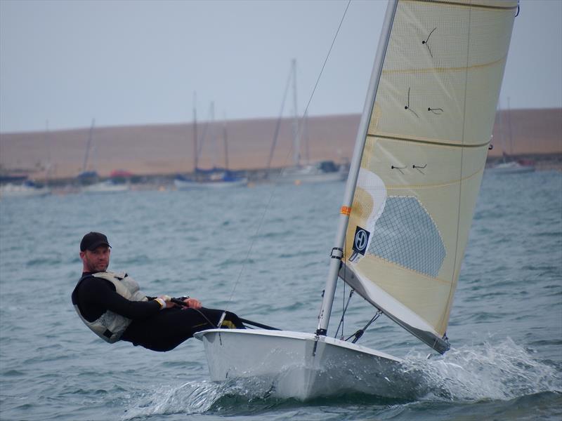 Event Leader Andy Davis on day 1 of the Solo Nationals at the WPNSA photo copyright Will Loy taken at Weymouth & Portland Sailing Academy and featuring the Solo class