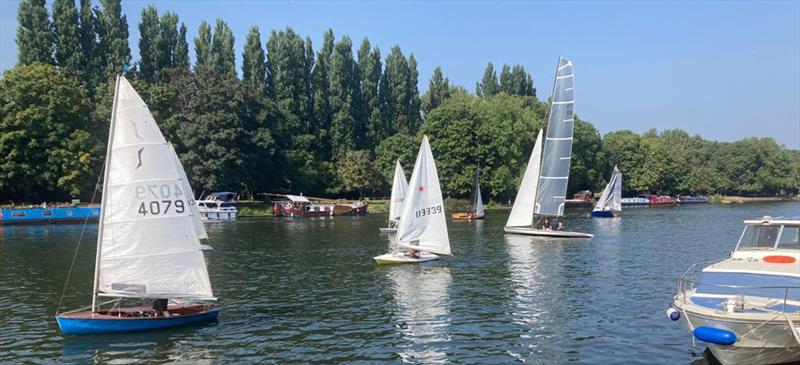 Matt Kyte's Rater dwarfs the Lasers and Solos. In the background Merlin class winner Andy Harris rounds the downstream (and occasionally downwind) mark at the Minima Regatta photo copyright Lindsay Forbes taken at Minima Yacht Club and featuring the Solo class