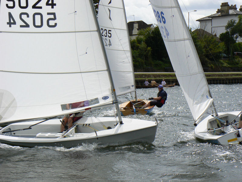 A gusty south-westerly for the Enterprises and Solos at Minima photo copyright Peter Halligan taken at Minima Yacht Club and featuring the Solo class