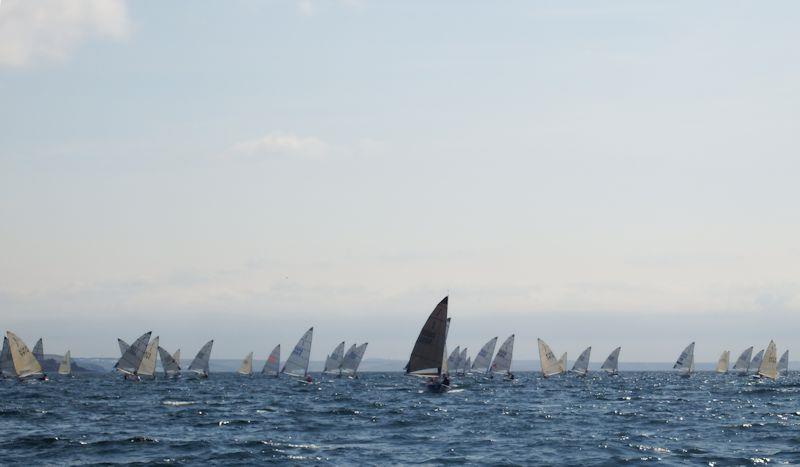 Doug Latta in Solo 6000 leads the fleet on day 4 of the Rooster Solo National Championship photo copyright Will Loy taken at Mount's Bay Sailing Club, England and featuring the Solo class