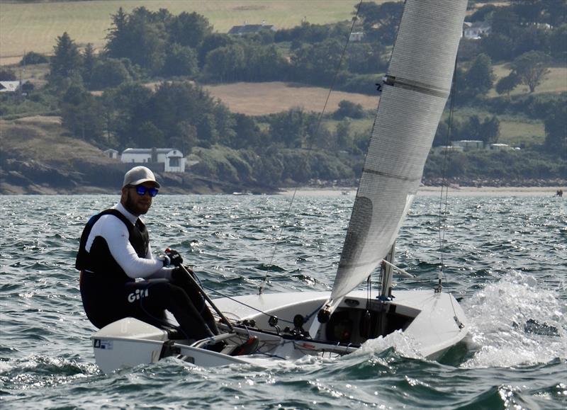 Alexander Alcock, oblivious to his rigging error but still fast on day 3 of the Solo Nationals at Abersoch photo copyright Will Loy taken at South Caernarvonshire Yacht Club and featuring the Solo class