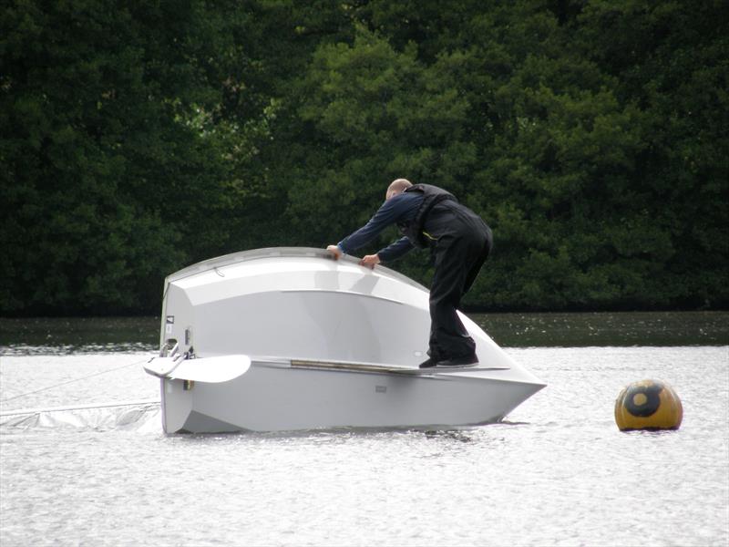 Ted decides he's a bit too warm during the 2023 Border Counties Midweek Sailing Series at Redesmere photo copyright John Nield taken at Redesmere Sailing Club and featuring the Solo class