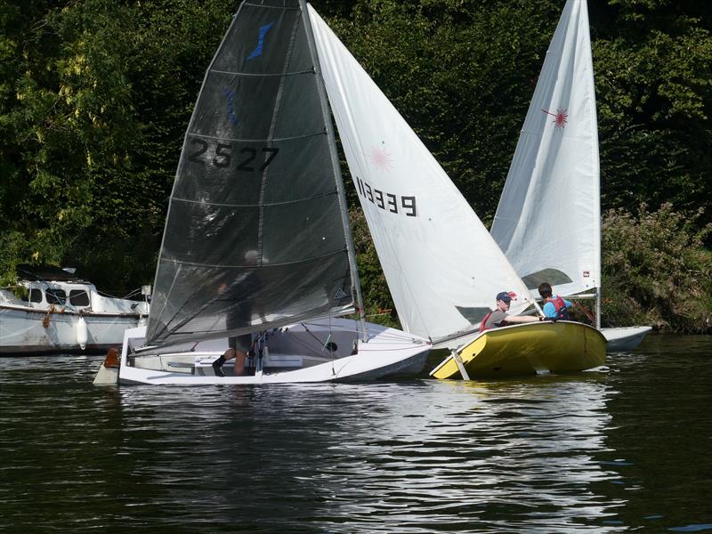 Class winner Nick Titley's Solo (2527) and Ed Cubitt's second-placed Laser at close quarters in the fourth race at at the Minima Regatta 2023, in the background Laser winner Henry Medcalf has his bow just in front - photo © Rob Mayle