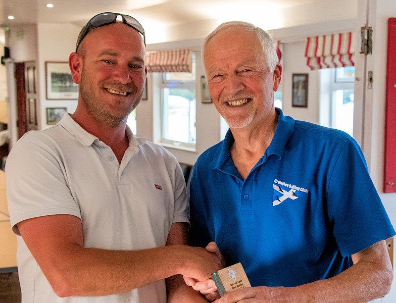 Hugh Ambrey from Cransley SC receives the 3rd Solo trophy from Vice Commodore Roo Jarvis - Solo and Laser Open Meeting at Middle Nene photo copyright David Livingstone taken at Middle Nene Sailing Club and featuring the Solo class
