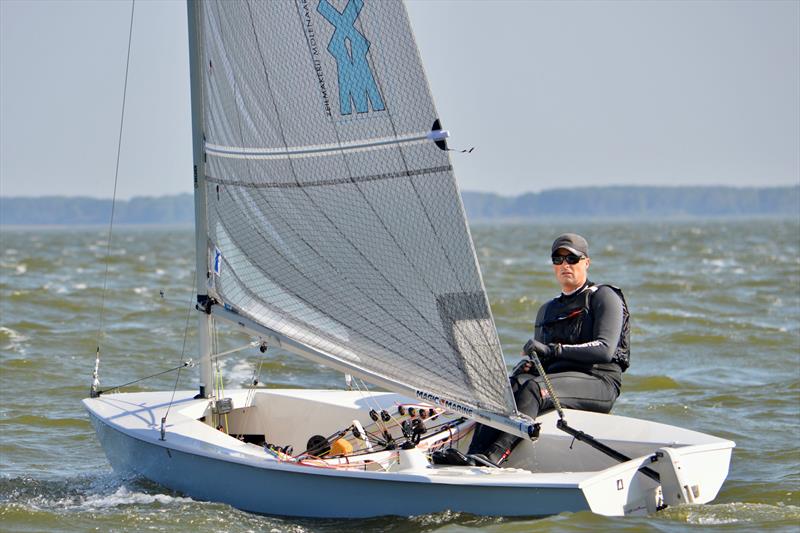 Menno Huisman pushing his Moolenaar-powered Solo hard photo copyright Will Loy taken at Circolo vela Bellano and featuring the Solo class