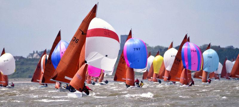 A perfect week for the 40th Anniversary Squib nationals photo copyright www.tuckettphoto.com taken at Holyhead Sailing Club and featuring the Squib class