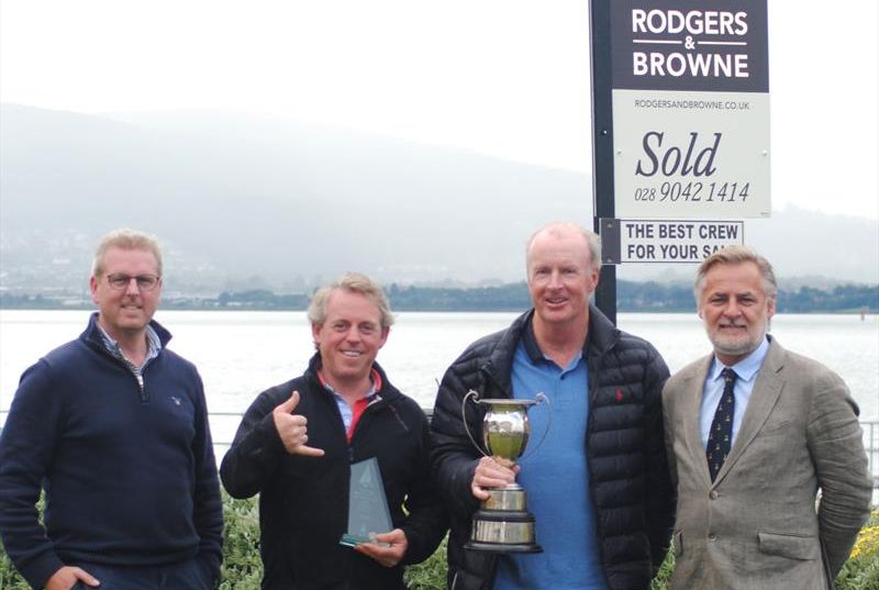 Squib Championship of Ireland 2023 - Winner, David Eccles with Michael Wright, proving that you can still be 'cool' at 50, together with sponsor Mr. Browne all in blue and Vice Commodore Jonathan Millar photo copyright Lindsay Nolan-McCarty taken at Royal North of Ireland Yacht Club and featuring the Squib class