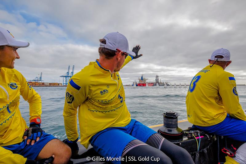 SSL Gold Cup 1/32 Finals Day 3 - Main trimmer for Ukraine Georgiy Paches photo copyright Martina Orsini / SSL Gold Cup taken at Real Federación Canaria de Vela and featuring the SSL47 class