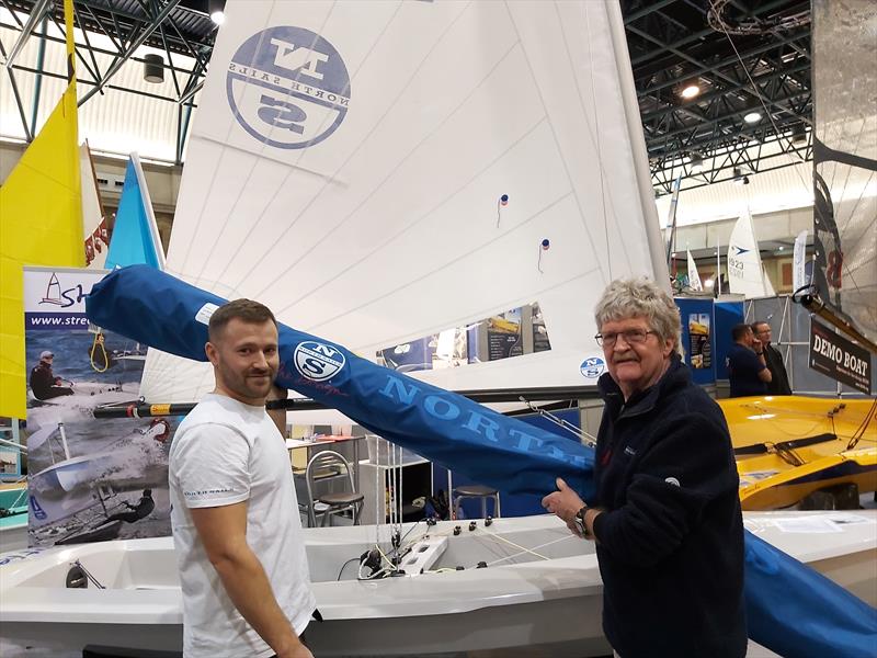 North's Tom Gillard presents a new sail to Andy Hague at RYA Dinghy Show 2020 photo copyright SCOA taken at RYA Dinghy Show and featuring the Streaker class