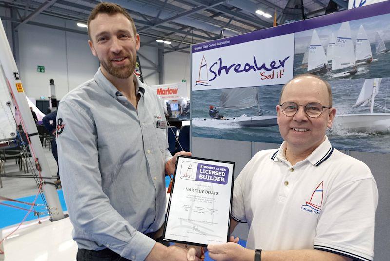 Mark Hartley of Hartley Boats receiving the Streaker Class Builders Licence from Alan Gillard at the RYA Dinghy Show photo copyright Neil Firth taken at RYA Dinghy Show and featuring the Streaker class
