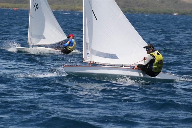 St. Croix's Peter Stanton, right, sails to the top of the ISCA Class on day 3 of the 52nd St. Thomas International Regatta - photo © STIR / www.ingridabery.com