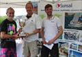 Overall winner Jon Modral-Gibbons receives the Portsmouth Regatta Cup from Regatta Director Adrian Saunders accompanied by James Foot of Sunsail © Paula Flack