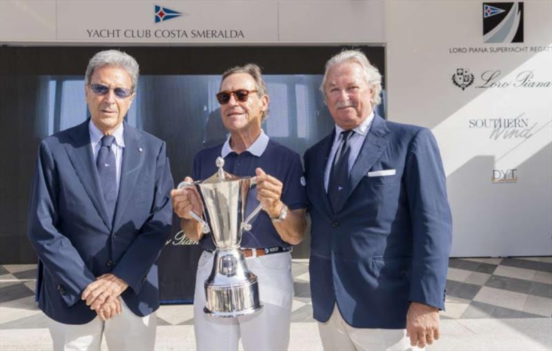 YCCS Commodore Riccardo Bonadeo and Pier Luigi Loro Piana award the Silver Jubilee Cup to Sir Lindsay Owen-Jones. Loro Piana Superyacht Regatta 2019 photo copyright Carlo Borlenghi taken at Yacht Club Costa Smeralda and featuring the Superyacht class