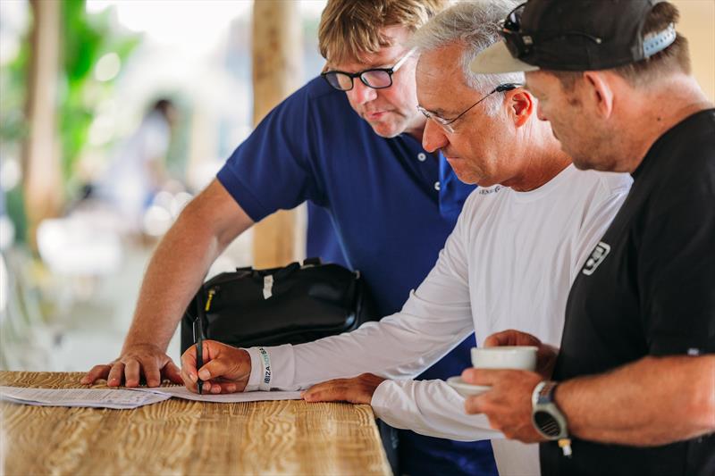 Ibiza JoySail Race Director Nacho Postigo (center) - photo © Sailing Energy