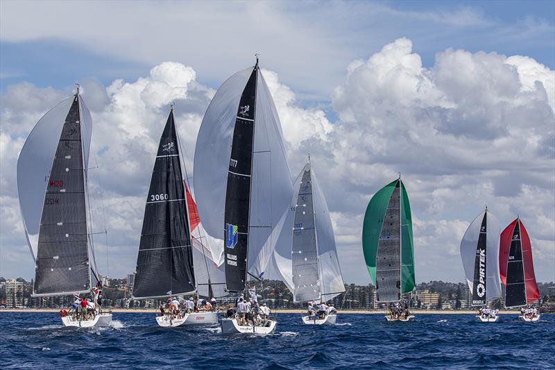 Sydney38s downwind at an S38 Australian Championship photo copyright Andrea Francolini taken at Middle Harbour Yacht Club and featuring the Sydney 38 class