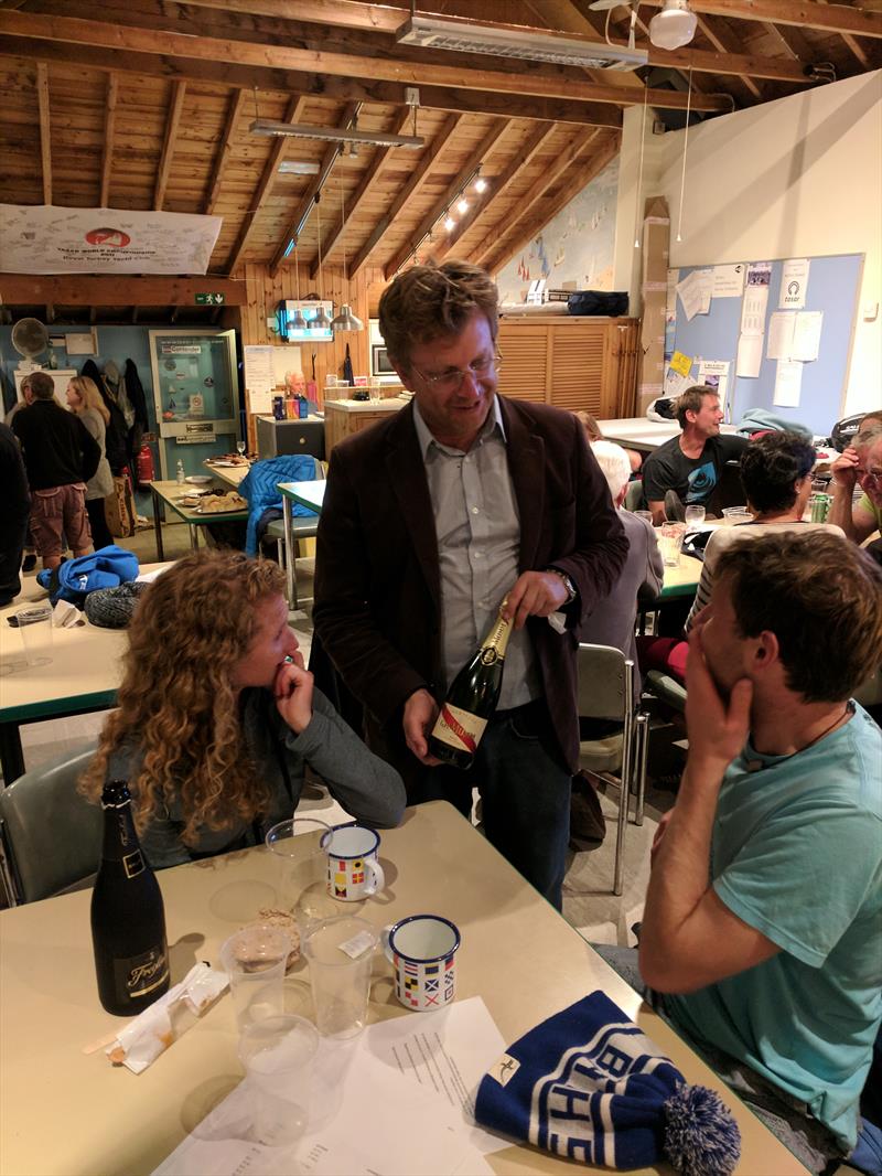 Commodore Paddy Seyler presenting newly engaged couple with a bottle of champagne during the Tasar Nationals at Porthpean photo copyright Sarah Desjonqueres taken at Porthpean Sailing Club and featuring the Tasar class