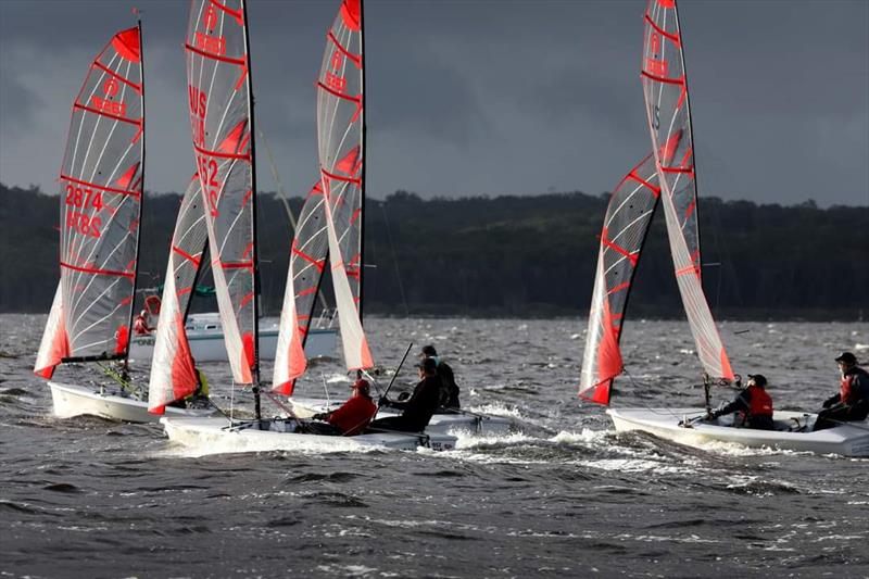 Competitors racing in between rain squalls on Race Day 1 at the NSW Tasar States 2022 - photo © Sail Port Stephens / @sailorgirlHQ