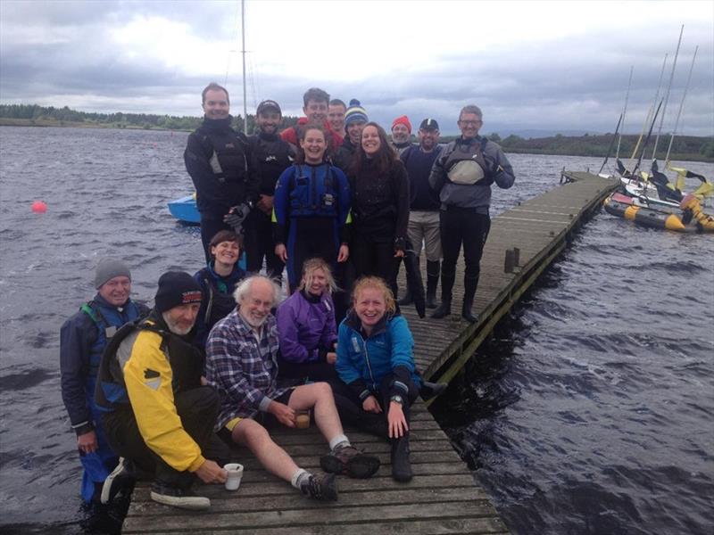 Competitors on the pontoon during the Scottish Team Racing at Cumbernauld SC photo copyright David Peace taken at Cumbernauld Sailing Club and featuring the Team Racing class