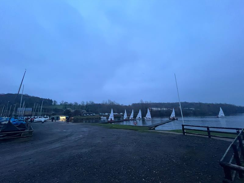 Heading ashore in the gloaming during the NEYYSA Random Pairs Christmas Team Racing photo copyright Veronica Shackleton taken at Ripon Sailing Club and featuring the Team Racing class