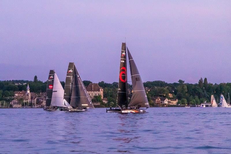 Still close after hours of racing, very light wind and getting dark photo copyright Jeanmi Photographies taken at Société Nautique de Genève and featuring the TF35 class