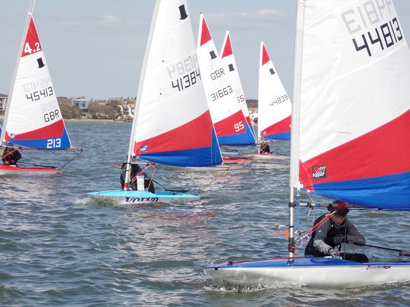 Toppers during the Christchurch Sailing Club Easter Series photo copyright Chris Arnell taken at Christchurch Sailing Club and featuring the Topper class