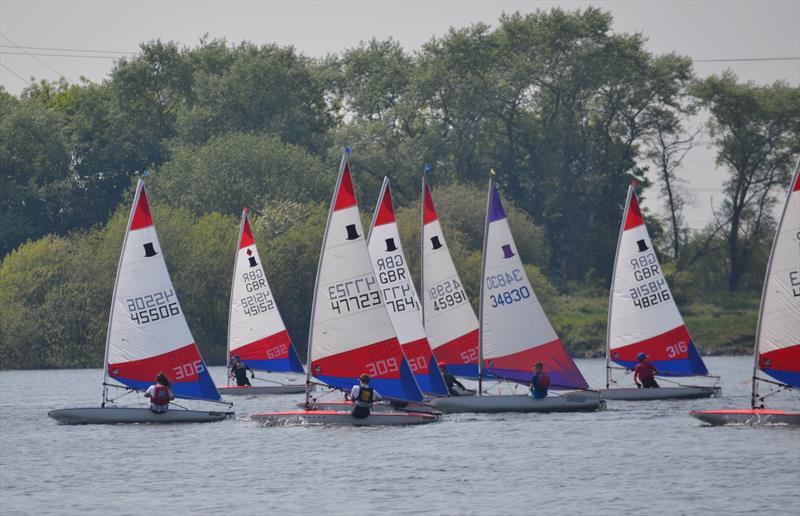 Close upwind racing during the Midlands Topper Travellers at Chase photo copyright V Turnbull taken at Chase Sailing Club and featuring the Topper class