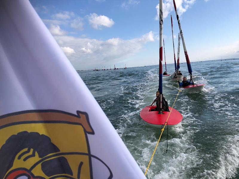 Toppers under tow during the Topper Southern Area Championship at Warsash photo copyright Roger Cerrato taken at Warsash Sailing Club and featuring the Topper class